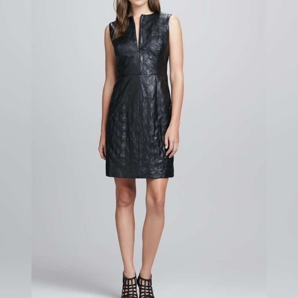 MILLY Black Leather/Tweed dress SZ 12
Zips in front and Full Zip in back